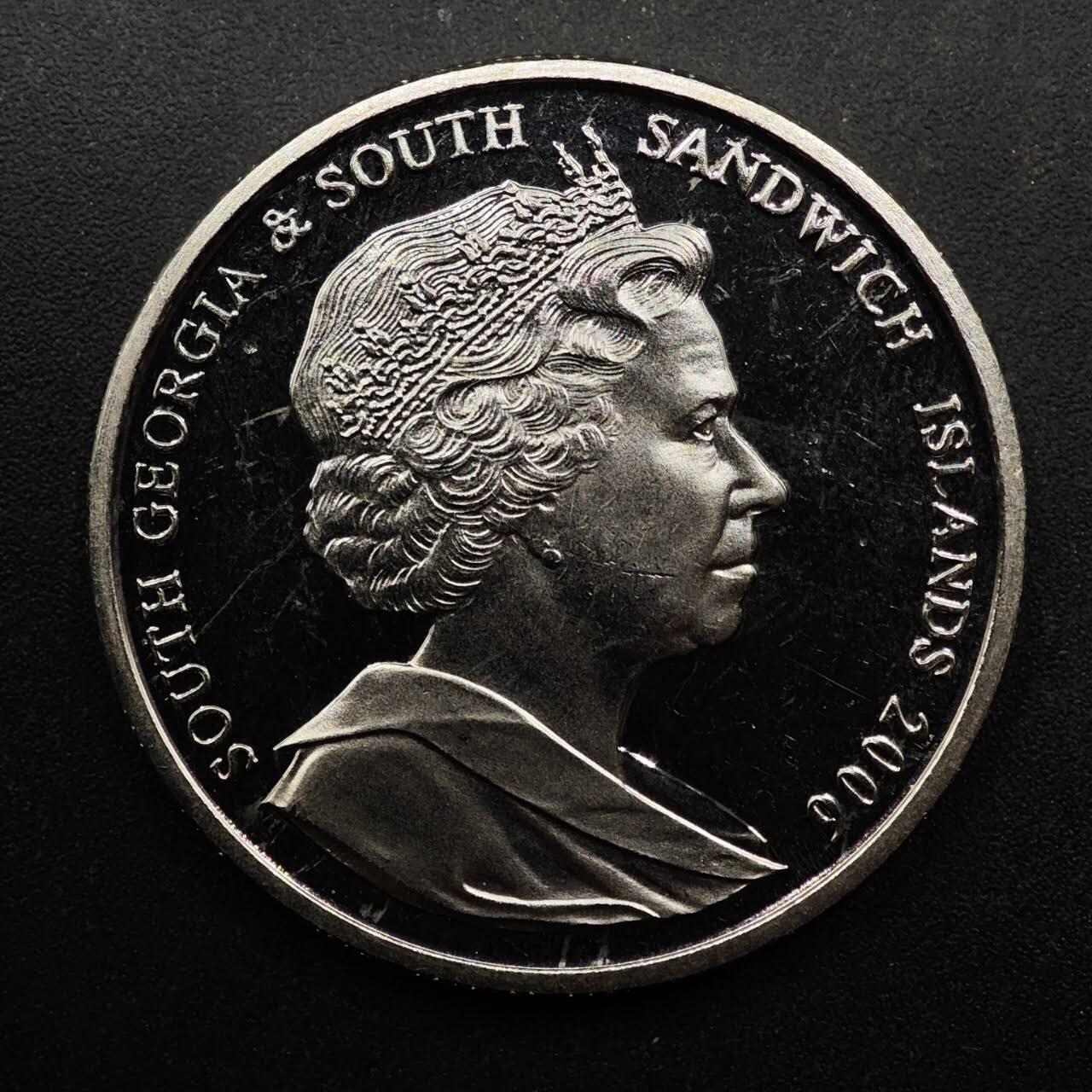  【淘币小摊】限时拍第八百七十拍   克朗币邮币封场    年前最后一场结束全部发出请更换最新收货地址不方便收货的请勿参拍或者顺丰到付 南乔治亚和南桑德威奇2006年2镑海豹纪念币