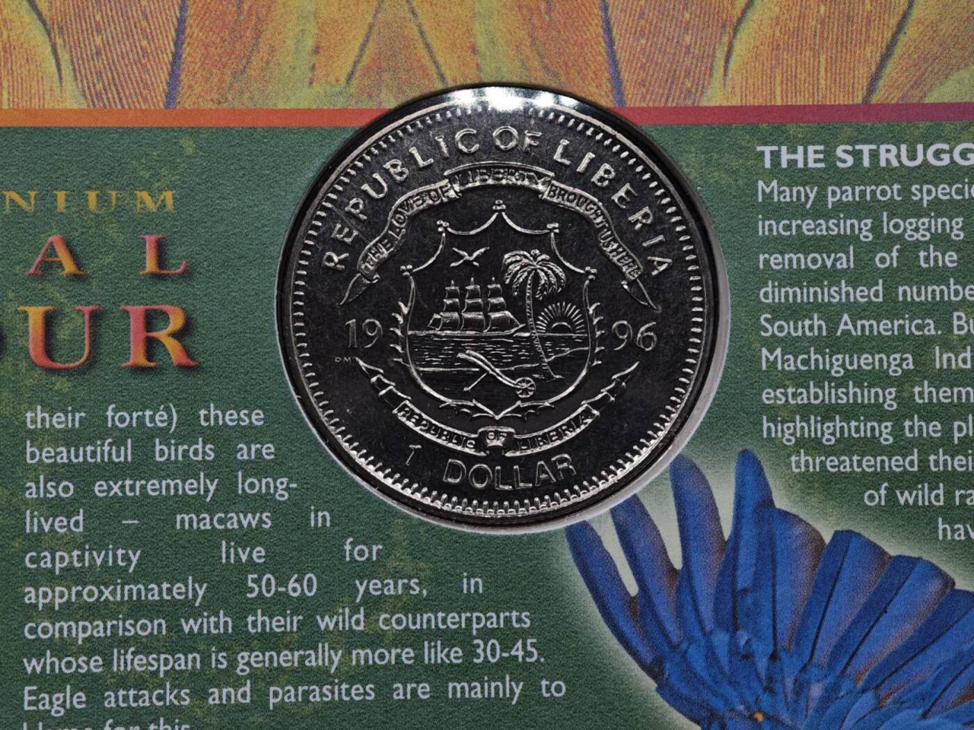  【淘币小摊】限时拍第八百七十拍   克朗币邮币封场    年前最后一场结束全部发出请更换最新收货地址不方便收货的请勿参拍或者顺丰到付 利比里亚1996年保护地球系列鹦鹉1元纪念币邮币封