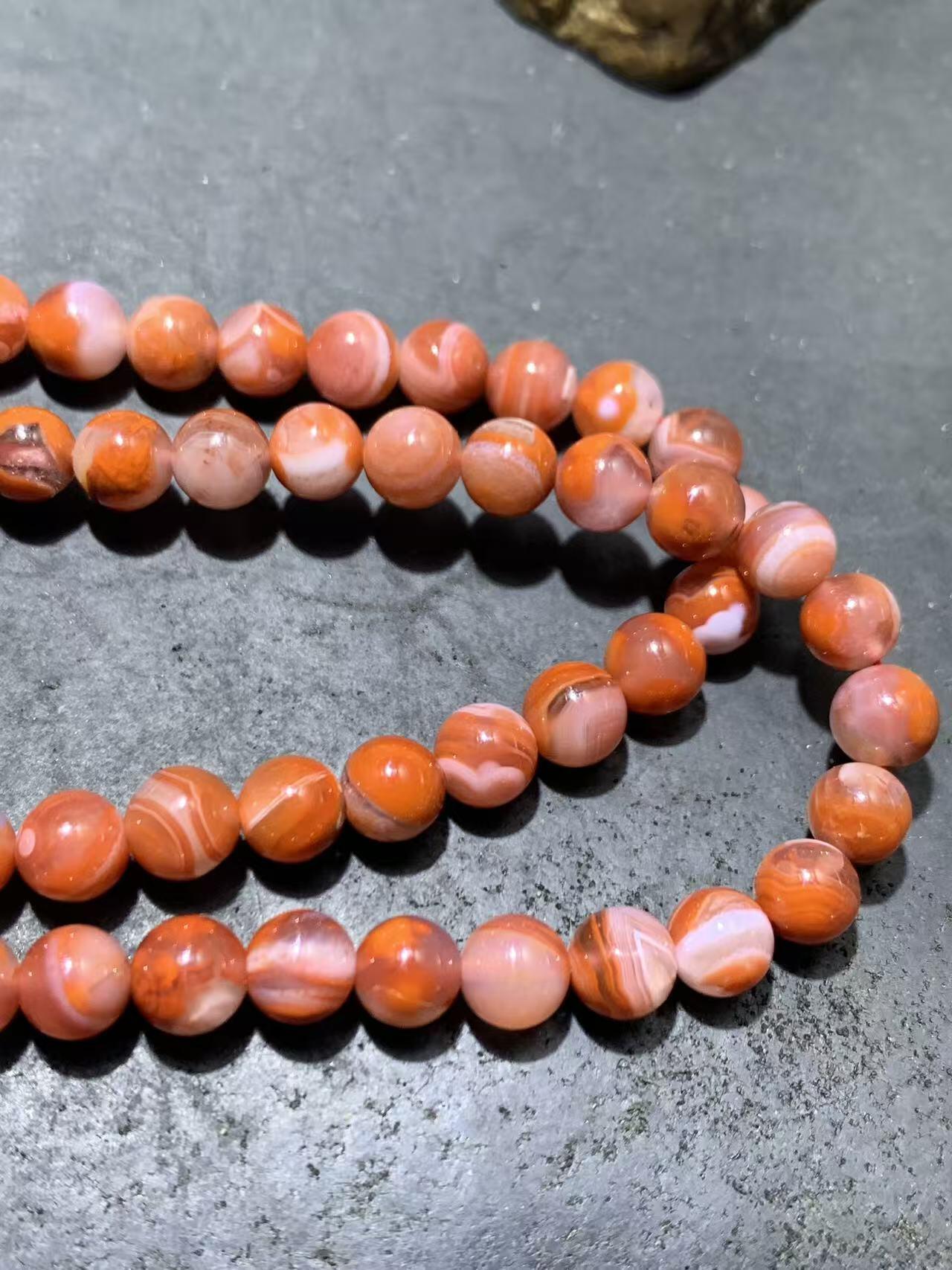 川料南红玛瑙柿子红冰飘多圈手串一条，