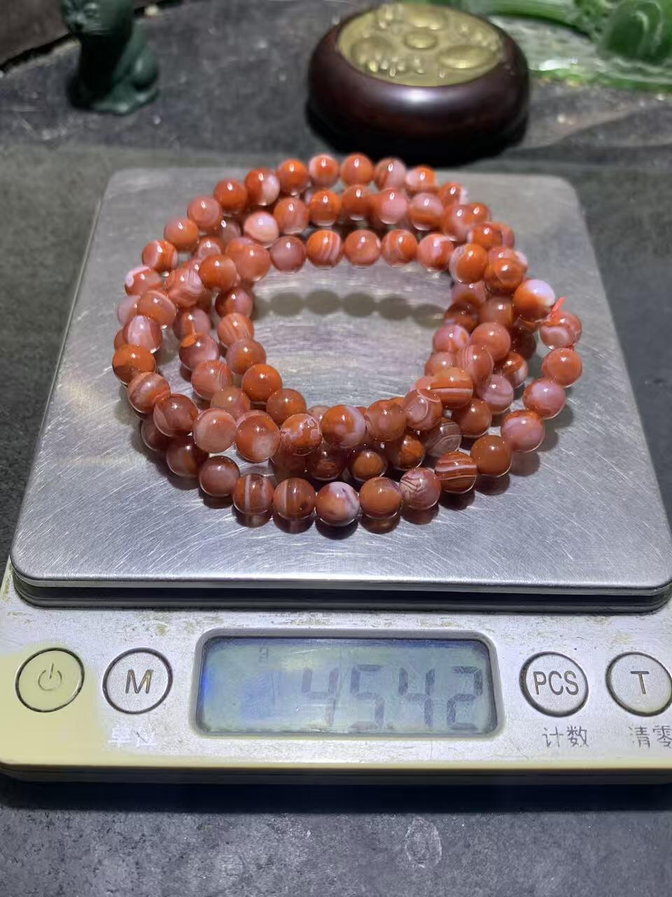 川料南红玛瑙柿子红冰飘多圈手串一条，