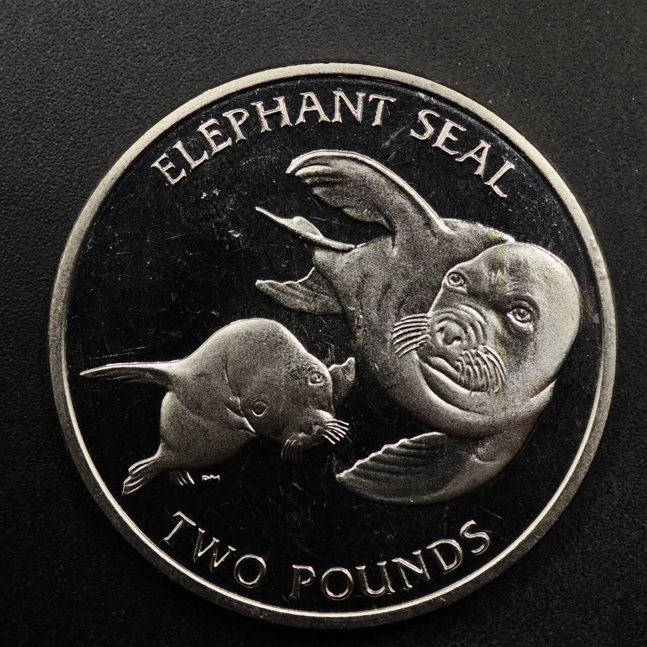  【淘币小摊】限时拍第八百七十拍   克朗币邮币封场    年前最后一场结束全部发出请更换最新收货地址不方便收货的请勿参拍或者顺丰到付 南乔治亚和南桑德威奇2006年2镑海豹纪念币