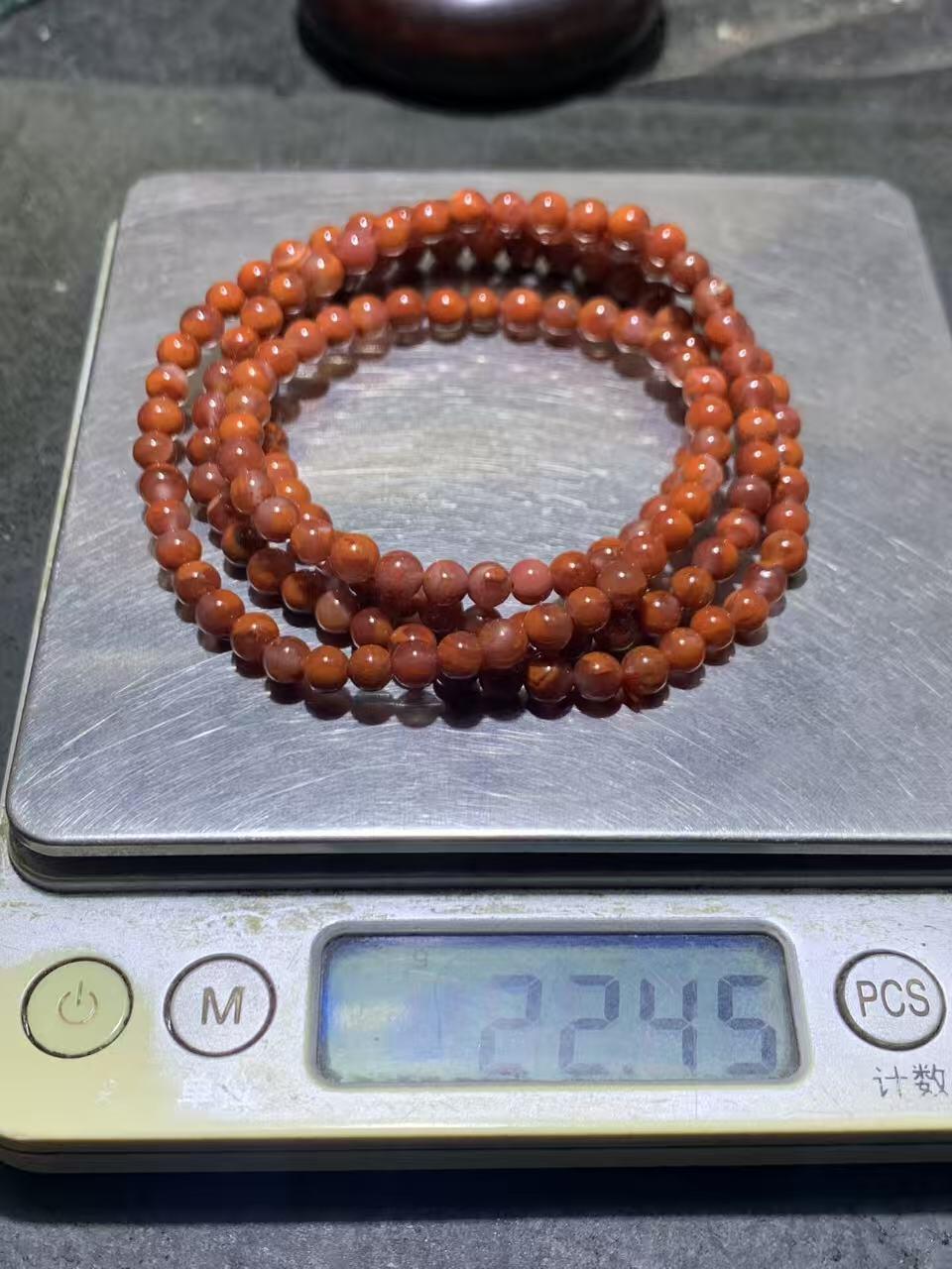 川料南红玛瑙冰飘柿子红多圈手串一条，