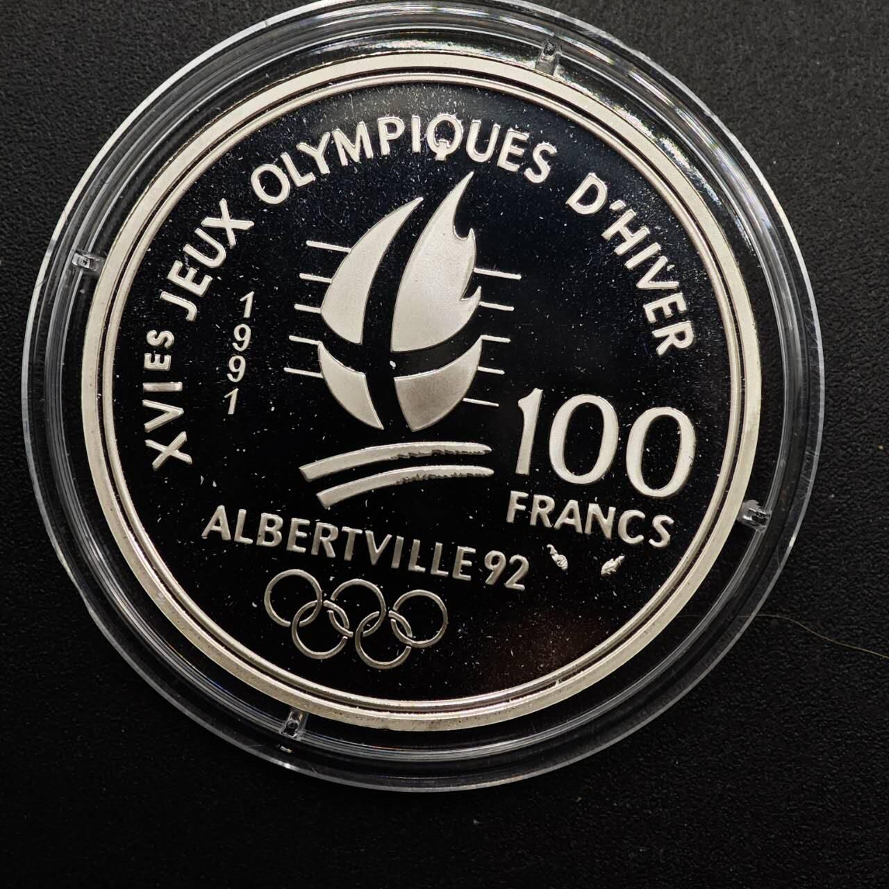 【淘币小摊】实时拍第八百七十拍   银币套币场    年前最后一场周一预留全部发出 本场无中意拍品可私信周日发货请更换最新收货地址不方便收货的请勿参拍或者顺丰到付 法国1990年100法郎精制银币 阿尔贝维尔冬奥会-冰球 22.2克900银