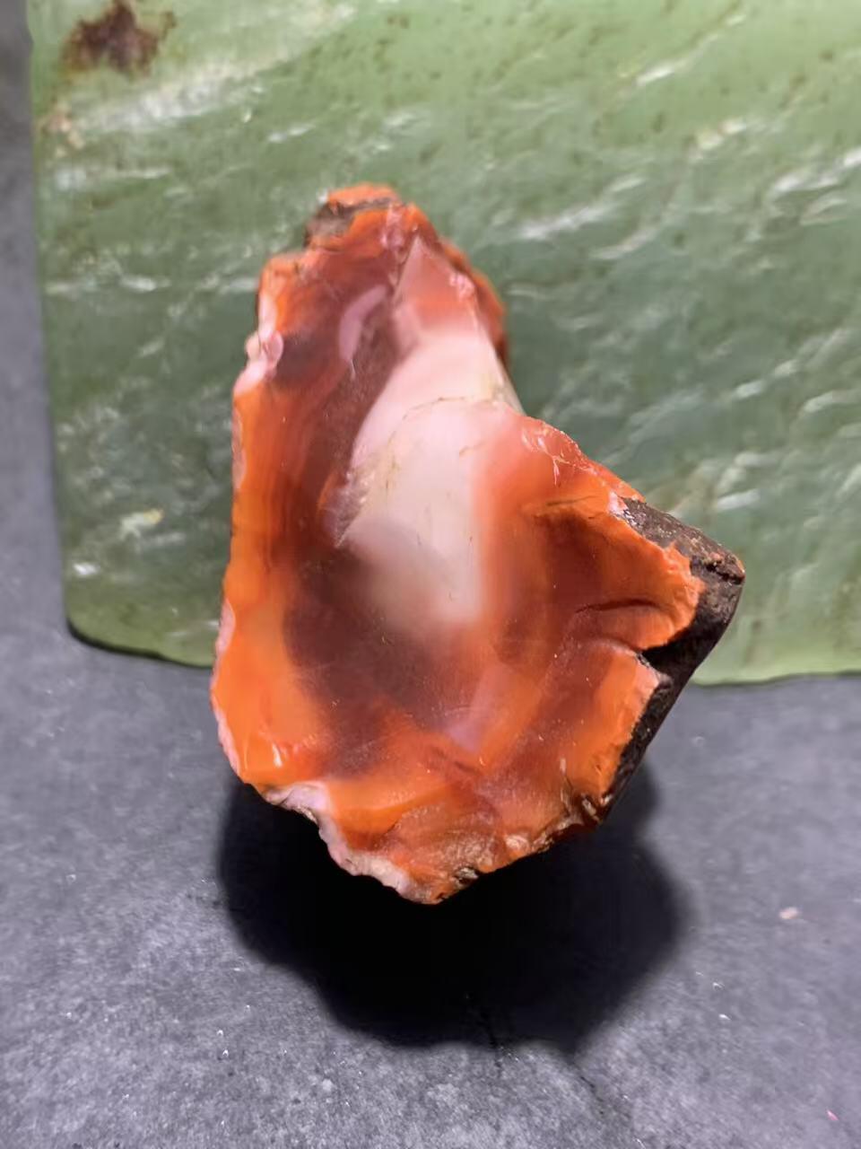 精美原皮冰飘柿子红南红玛瑙原石一颗，