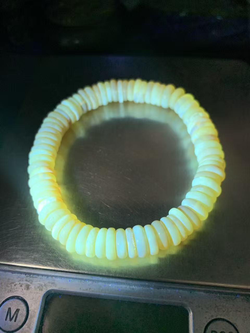 精美天然乌料蜜蜡隔片手串1条！