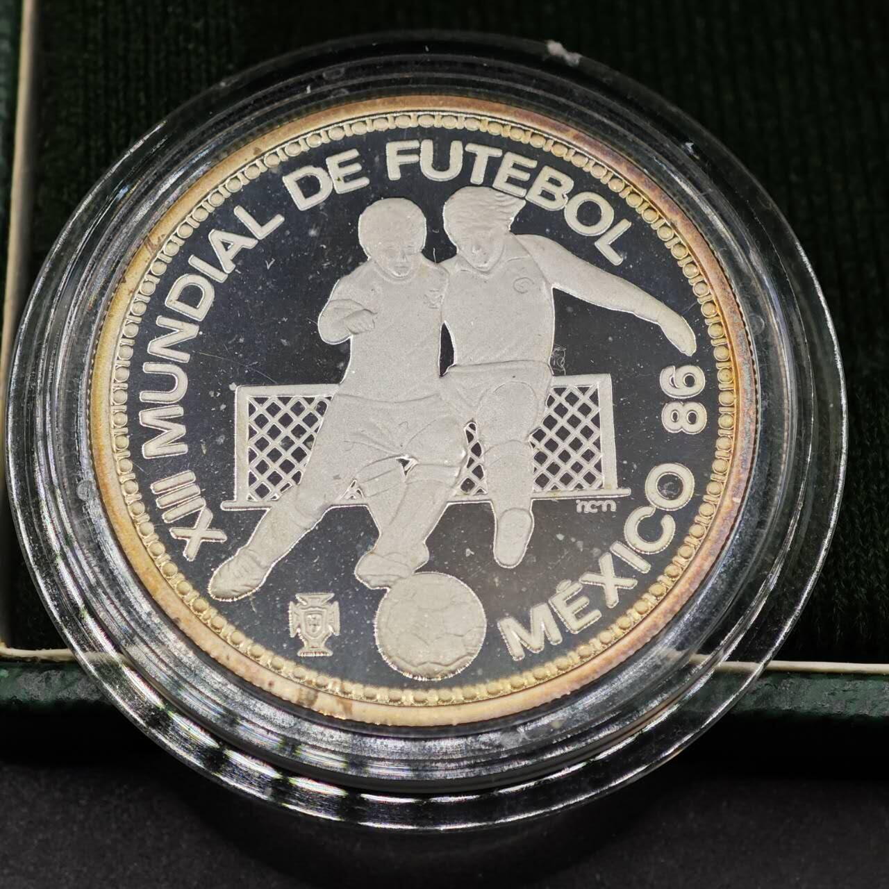 【淘币小摊】实时拍第八百七十拍   银币套币场    年前最后一场周一预留全部发出 本场无中意拍品可私信周日发货请更换最新收货地址不方便收货的请勿参拍或者顺丰到付 葡萄牙1986年100埃斯库多精制银币 86年墨西哥世界杯 925银16.5克 发行量：1万 盒证全