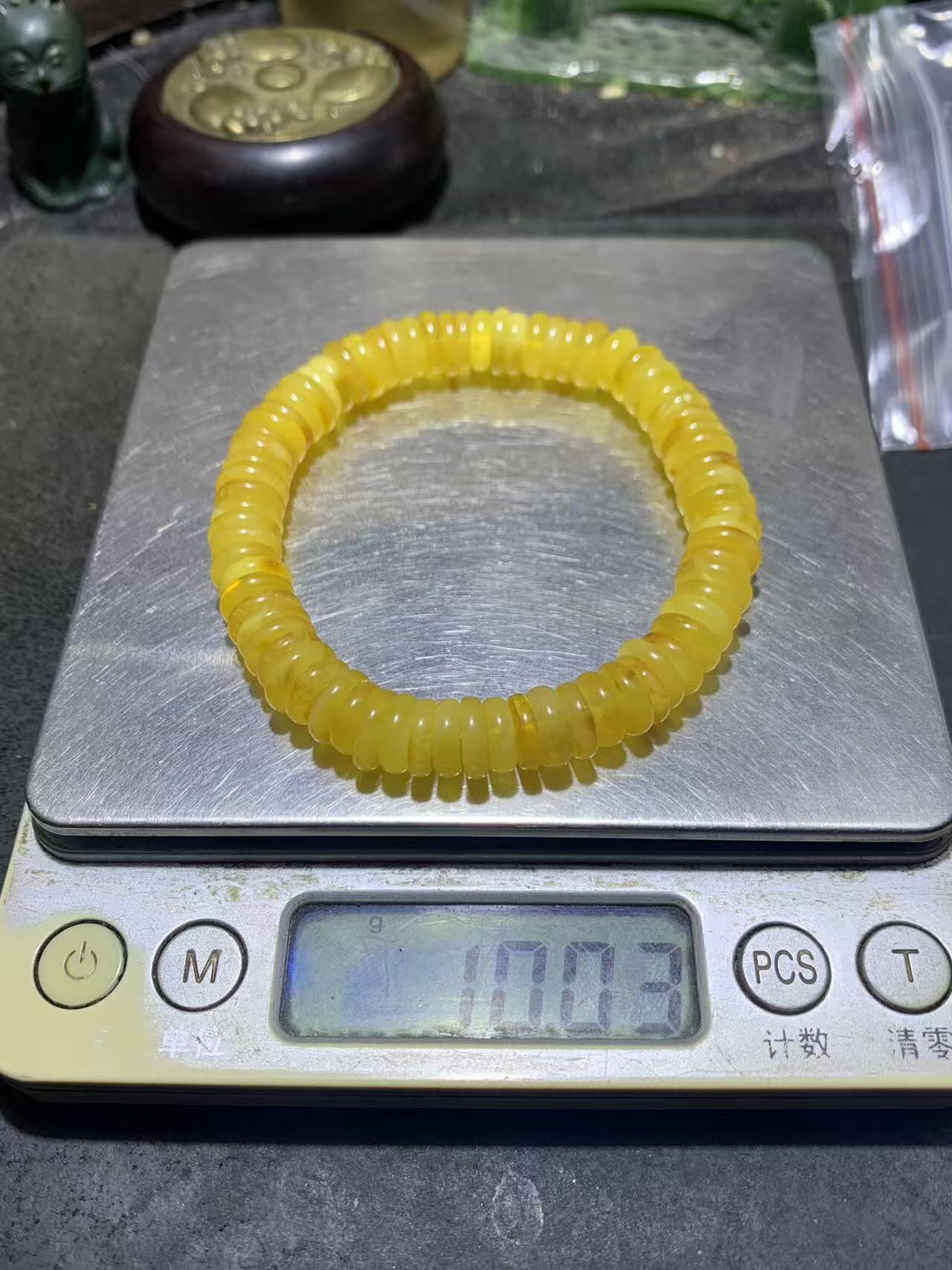 精美天然乌料蜜蜡隔片手串1条！