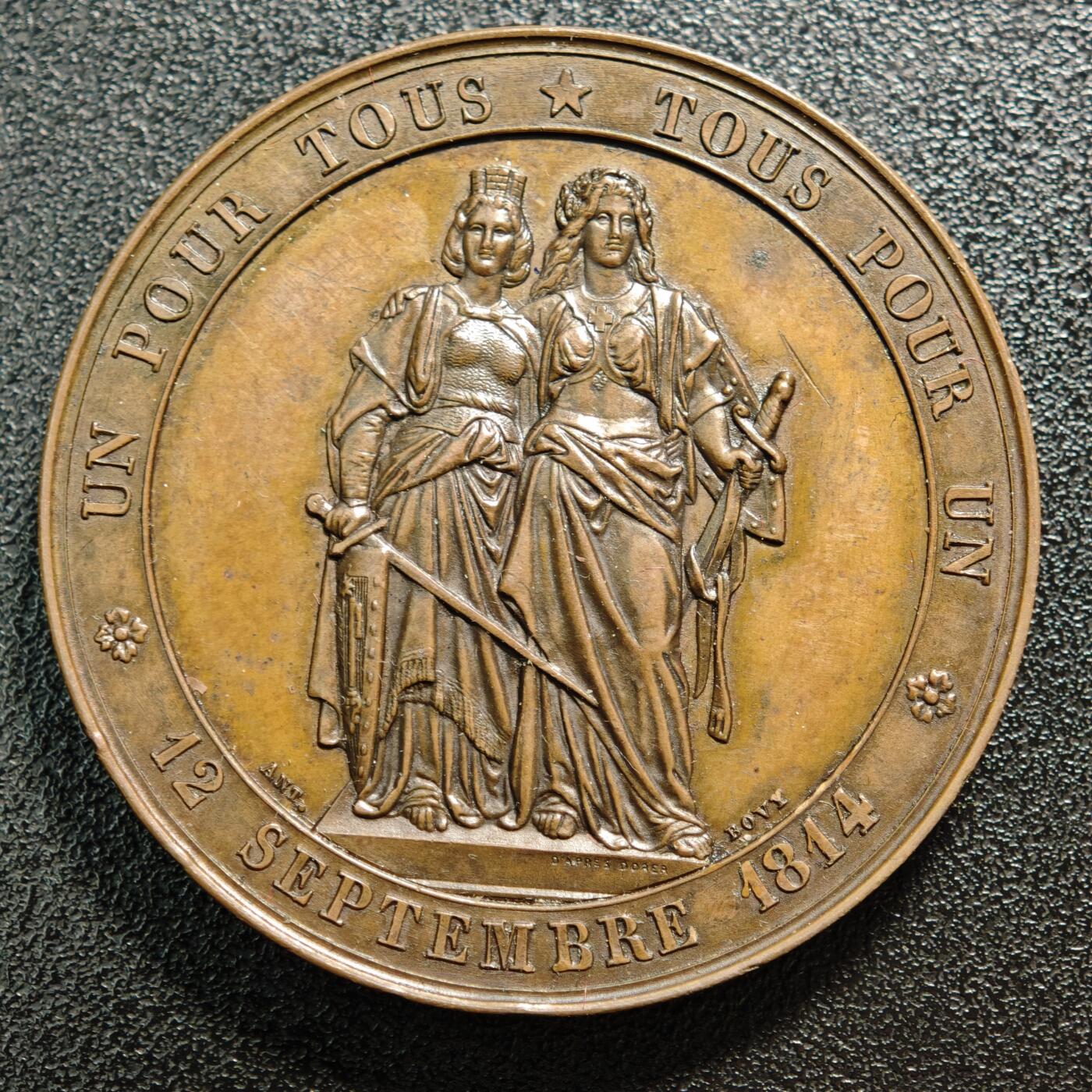 【德藏】世界币章拍卖第165期（拍品征集中~欢迎藏友联系） 1864年 日内瓦加入瑞士联邦50周年纪念铜章 由瑞士日内瓦铸造纪念1814年9月12日日内瓦正式并入瑞士联邦的半世纪节点 日内瓦自16世纪起为独立共和国，1814年拿破仑战争结束后，经维也纳会议决议正式加入瑞士联邦，成为瑞士的第22个州 直径约：47mm；重约：60g直径约：47mm；重约：58.7g