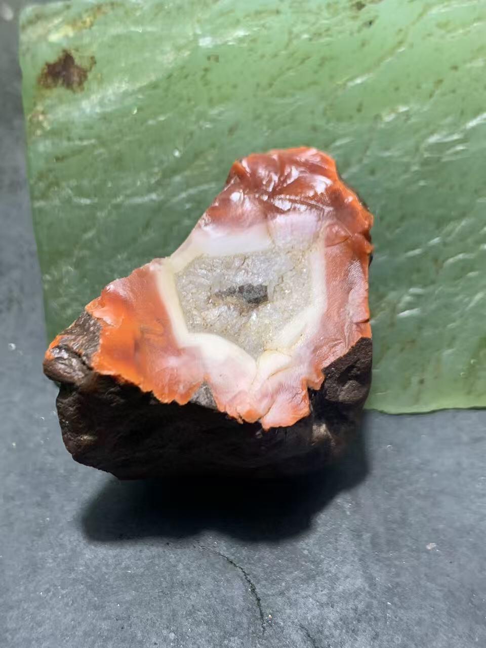 精美原皮冰飘柿子红南红玛瑙原石一颗，