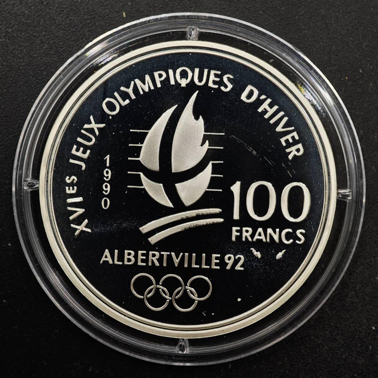 【淘币小摊】实时拍第八百七十拍   银币套币场    年前最后一场周一预留全部发出 本场无中意拍品可私信周日发货请更换最新收货地址不方便收货的请勿参拍或者顺丰到付 法国1990年100法郎精制银币 阿尔贝维尔冬奥会-回转滑雪 22.2克900银
