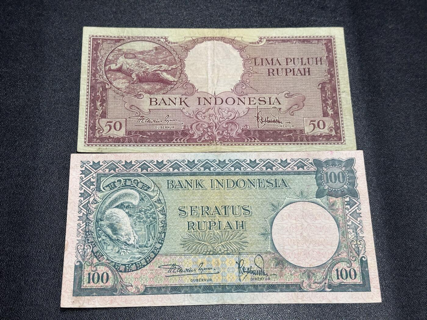 《外钞收藏家》第六百一十期（新年假期场/年后快递恢复正常再发货）（长期征集拍品、欢迎藏友们联系合作） 印尼50和100卢比 2张一起 非全新 品相如图