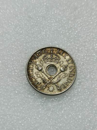 天下钱庄专场欢迎参拍 - 新几内亚中孔银币