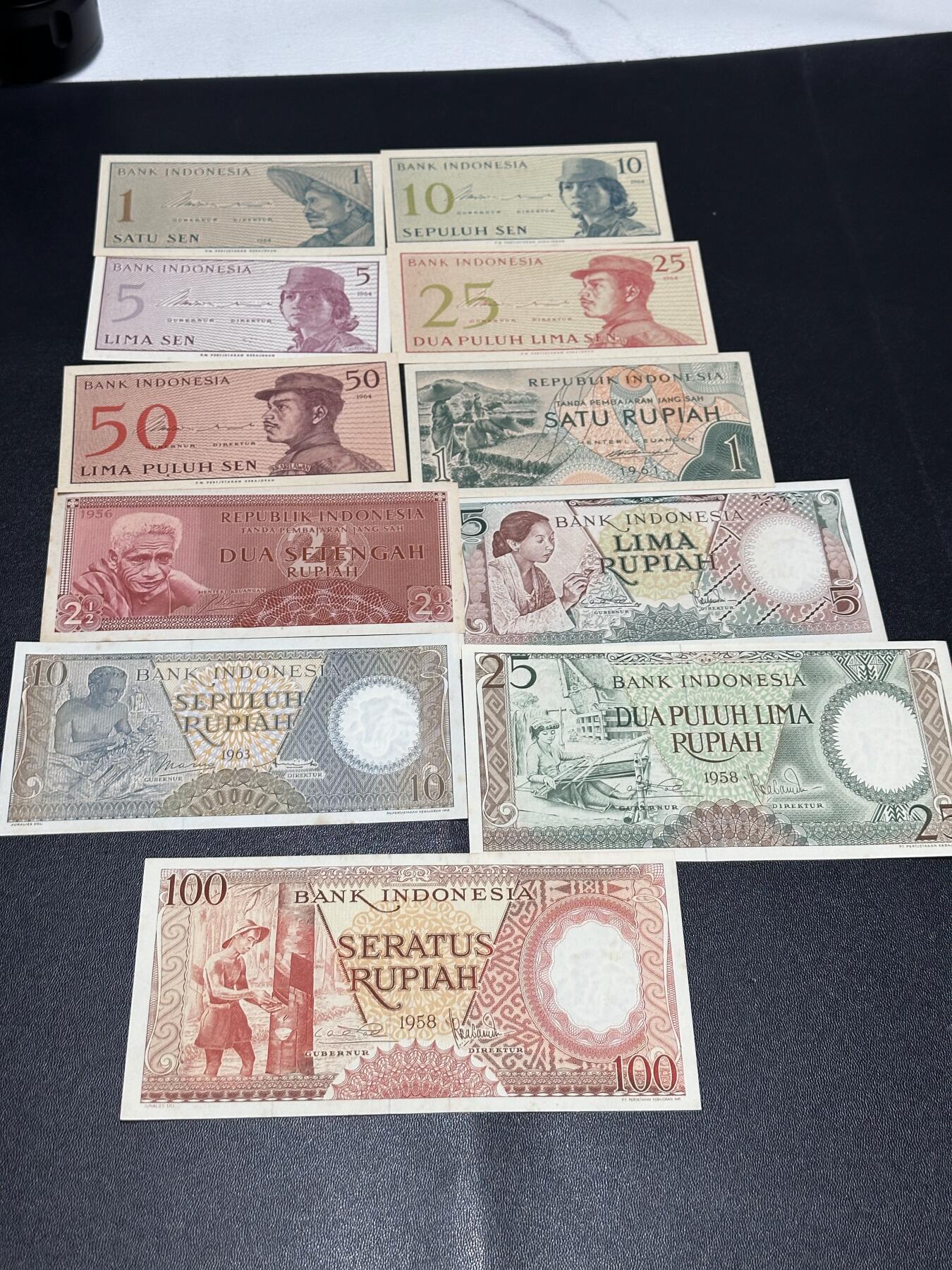 《外钞收藏家》第六百一十期（新年假期场/年后快递恢复正常再发货）（长期征集拍品、欢迎藏友们联系合作） 印尼1-100卢比 11张一起 有新有旧 品相如图