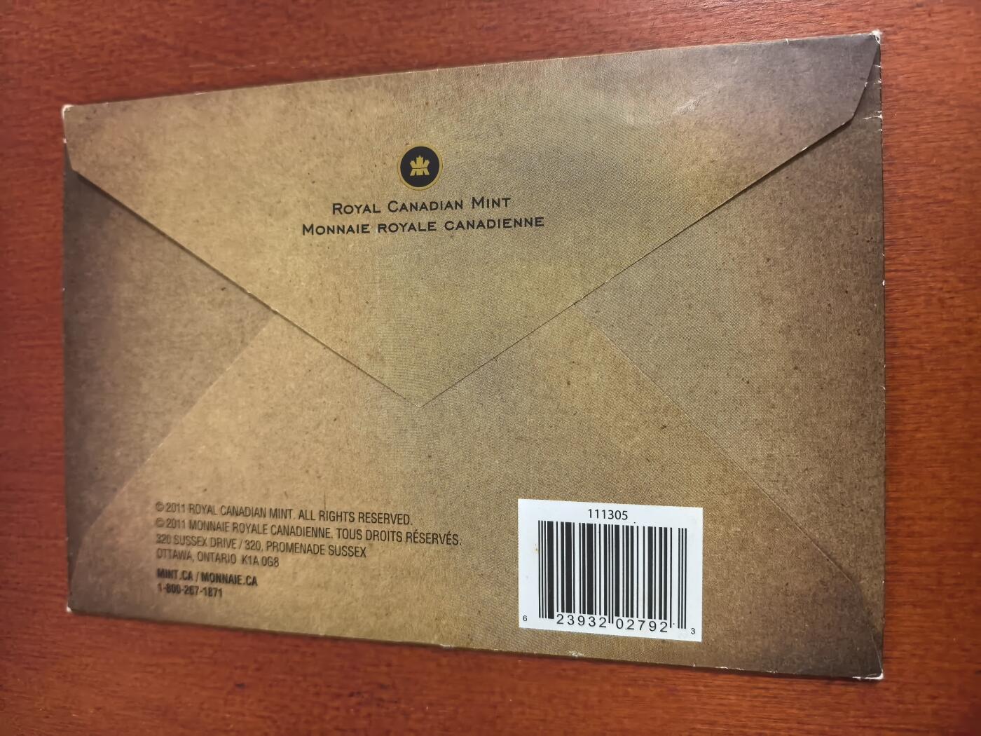 长老汇蛇年精选第九十九场拍卖 2011加拿大7枚套，原盒证，仅1元+2元克书就52美金了