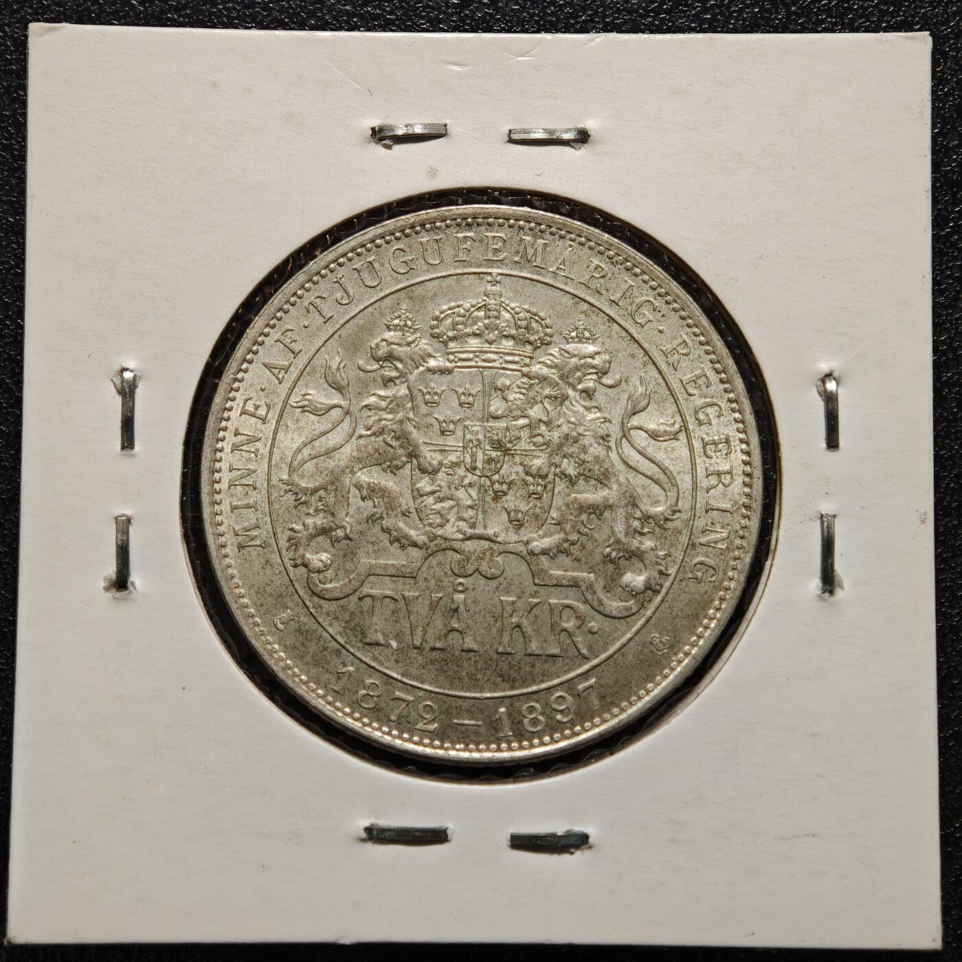 【德藏】世界币章拍卖第165期（拍品征集中~欢迎藏友联系） 老藏家集藏系列之- 1897年 丹麦奥斯卡二世国王登基2克朗纪念银币 800银 直径约：31mm；重约：15g 入册20余年·附有当年购入价