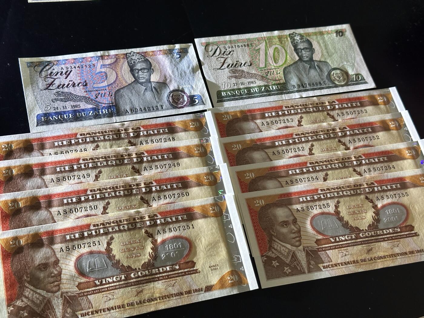 《外钞收藏家》第六百一十期（新年假期场/年后快递恢复正常再发货）（长期征集拍品、欢迎藏友们联系合作） 2001年海地20 八张一起+扎伊尔2张一起 全新 扎伊尔轻微潮