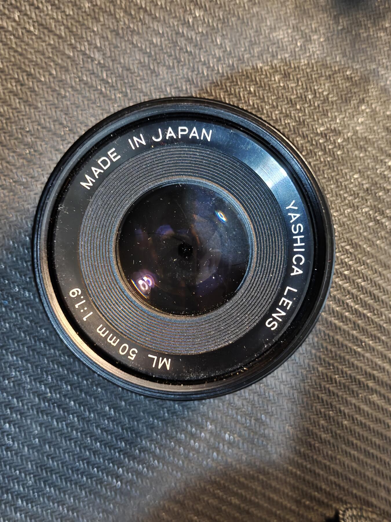 （450件拍品！制服徽章盛宴）罗岚⭐爱藏⭐年前甄选大拍场-店主清仓处理-分享拍场额外现金红包（实体经营） 1985年，雅西卡 fx3型相机，镜头可拆卸，正常变焦，光圈可正常使用，拍摄功能未测试，改革开放后首批进入中国的进口单反相机之一，日本原产，附带50mm变焦镜头，八十年代该相机售价为700人民币，等同于同时期普通工人一年工资，保存完好