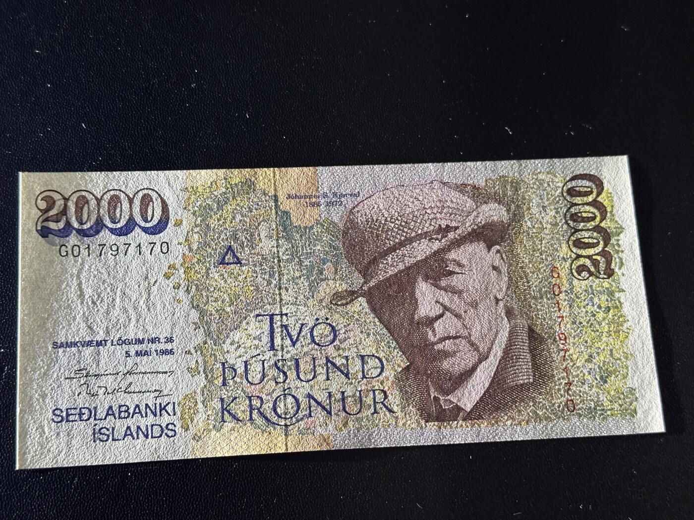 《外钞收藏家》第六百一十期（新年假期场/年后快递恢复正常再发货）（长期征集拍品、欢迎藏友们联系合作） 1986年冰岛2000克朗 全新 尾170 有极轻微荧光点