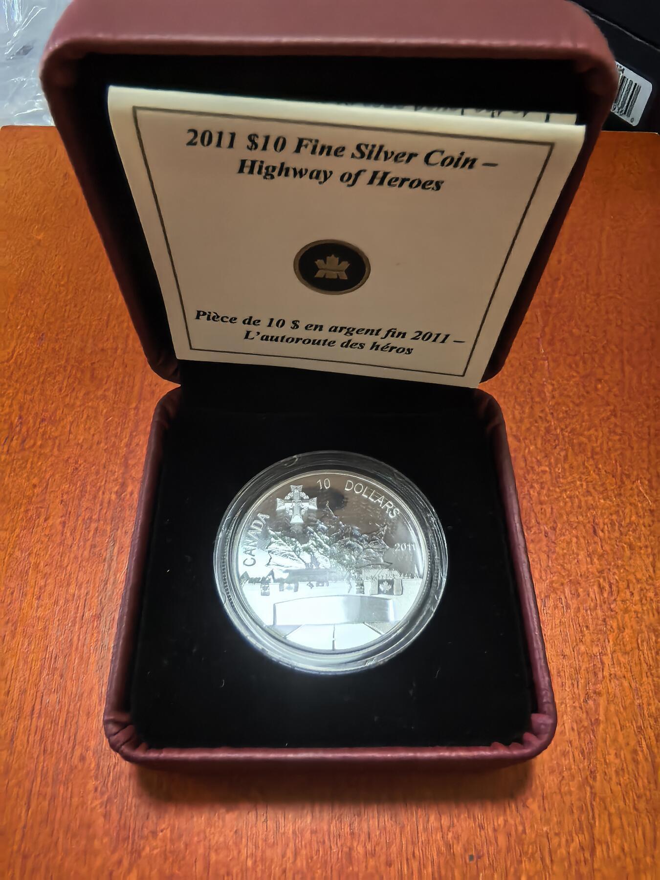 长老汇蛇年精选第一百场拍卖 2011加拿大高速路上的英雄10加元精制银币，15.87克999银，盒证全，7732枚