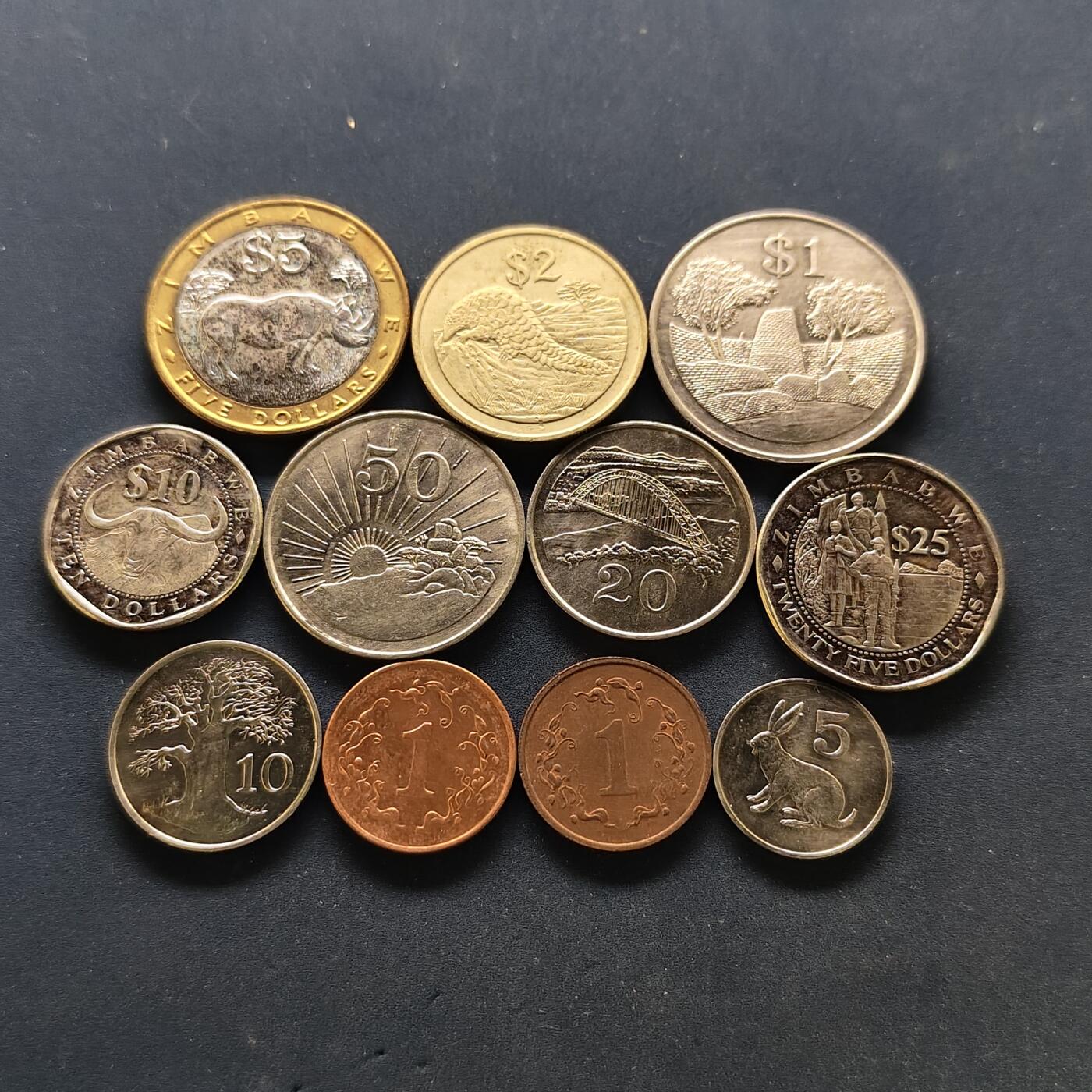 【全场包邮】纯粹捡漏拍502场 津巴布韦各年份铜钢版本1分2枚+首版7枚套+二版3枚-共计11枚一组