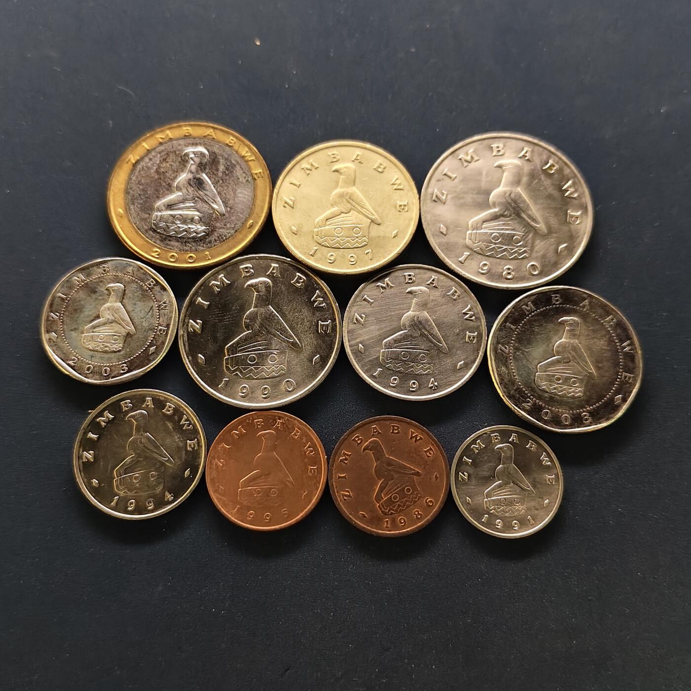 【全场包邮】纯粹捡漏拍502场 津巴布韦各年份铜钢版本1分2枚+首版7枚套+二版3枚-共计11枚一组