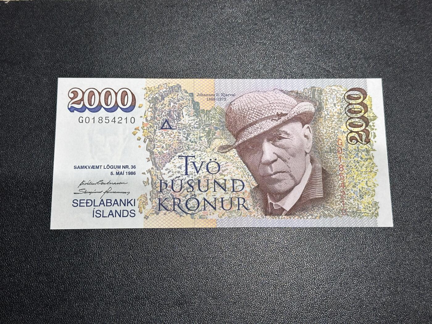 《外钞收藏家》第六百一十期（新年假期场/年后快递恢复正常再发货）（长期征集拍品、欢迎藏友们联系合作） 1986年冰岛2000克朗 全新 尾210