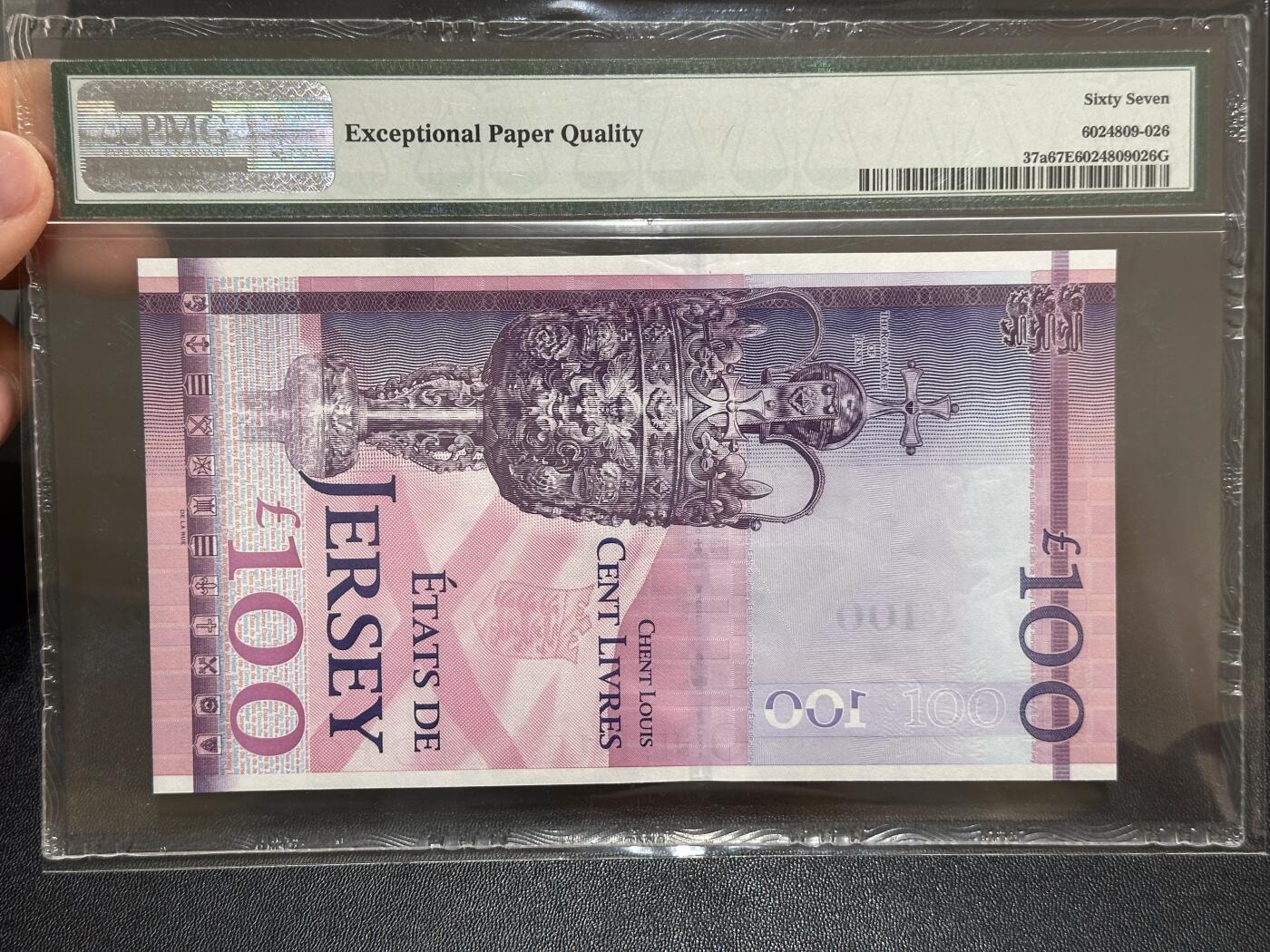 《外钞收藏家》第六百一十期（新年假期场/年后快递恢复正常再发货）（长期征集拍品、欢迎藏友们联系合作） 2012年泽西女王100镑 纪念钞 PMG67 千位8455号