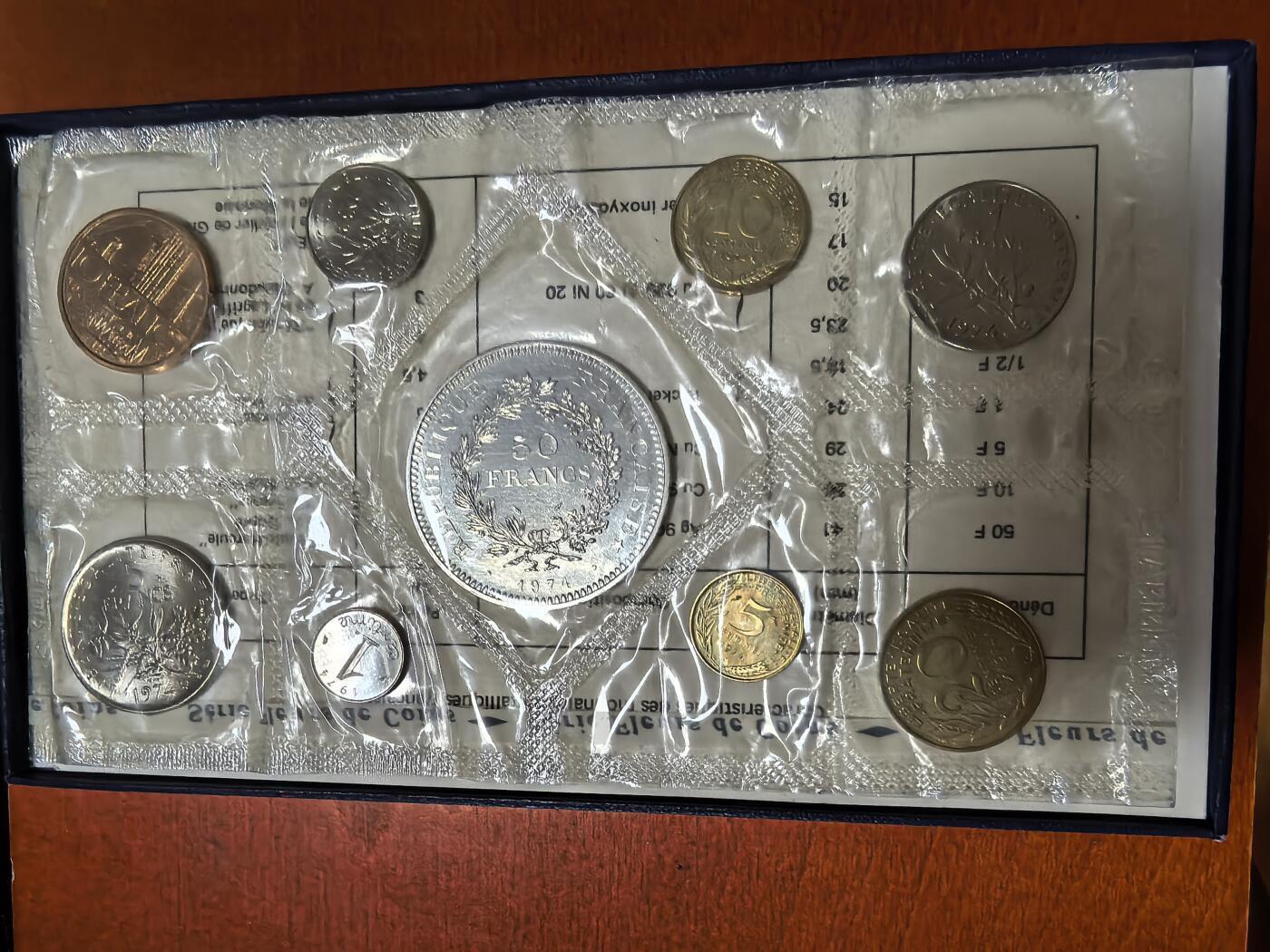 长老汇蛇年精选第一百场拍卖 1974法国9枚套币FDC，含50法郎大力神大银币1枚，30克900银，盒证全