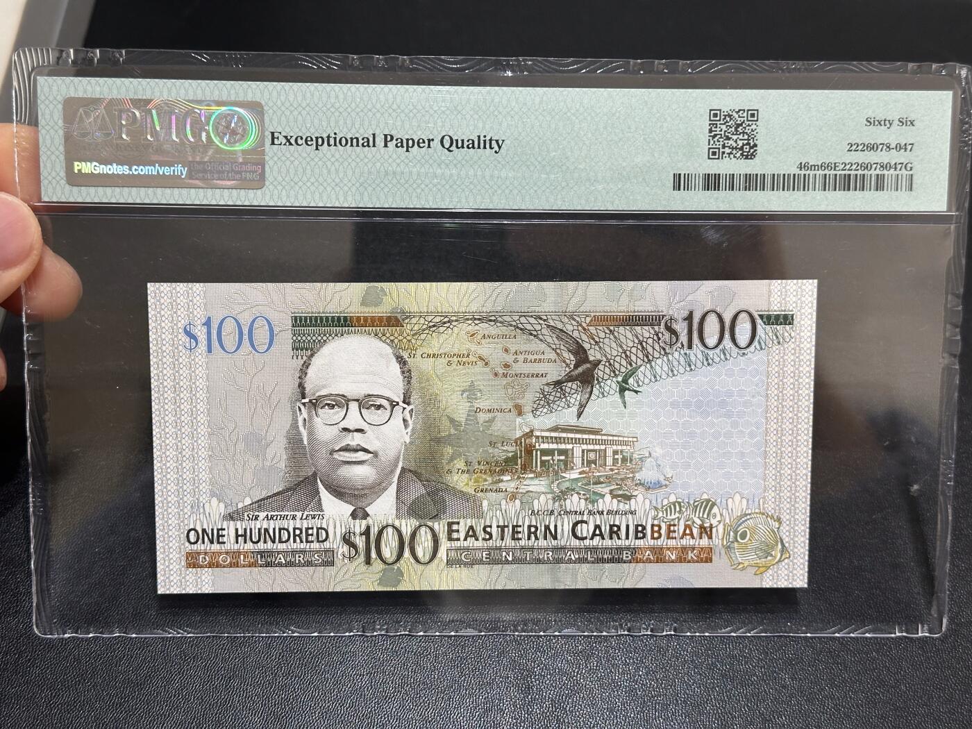 《外钞收藏家》第六百一十期（新年假期场/年后快递恢复正常再发货）（长期征集拍品、欢迎藏友们联系合作） 2003年东加勒比100元 PMG66