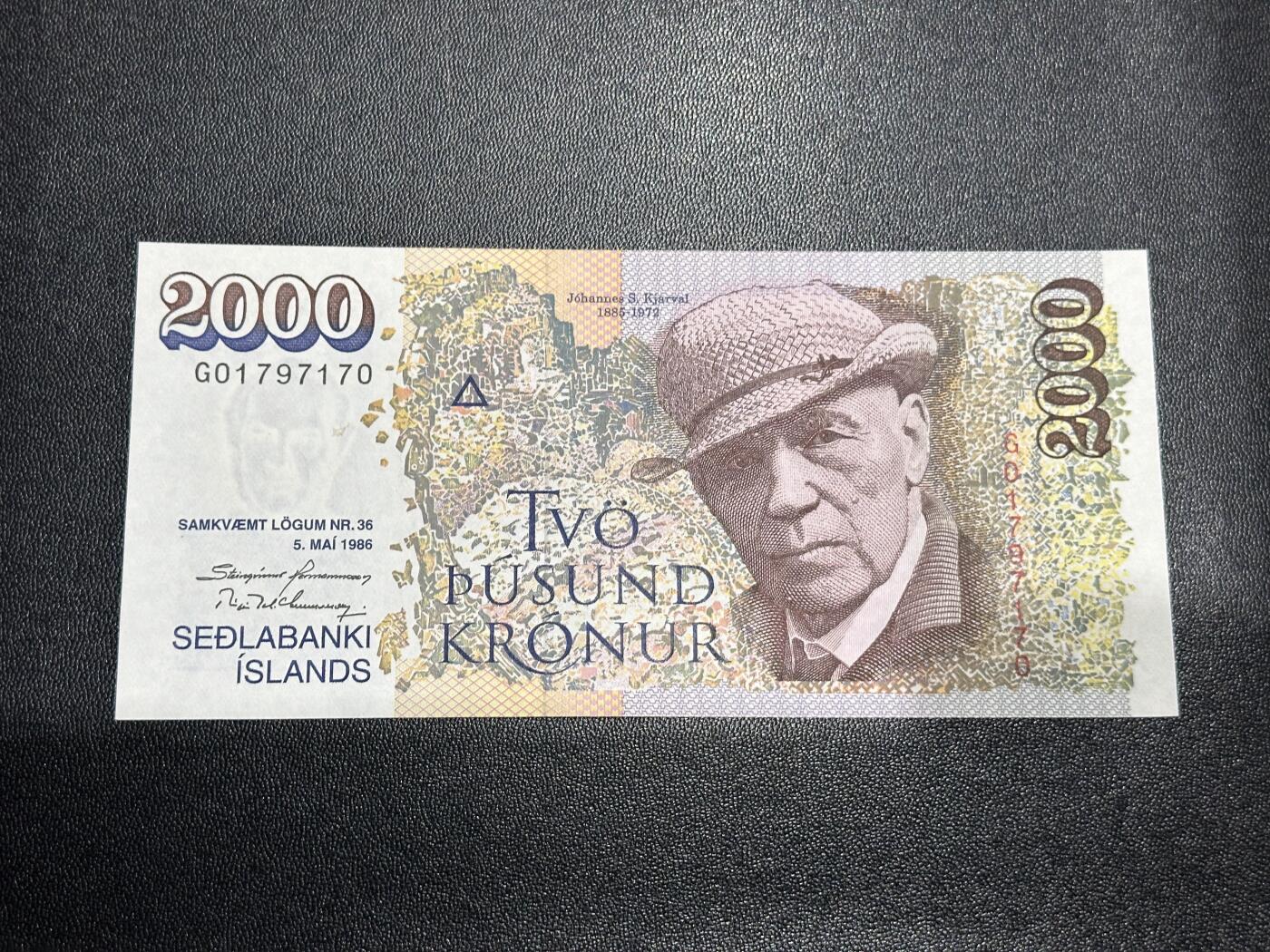 《外钞收藏家》第六百一十期（新年假期场/年后快递恢复正常再发货）（长期征集拍品、欢迎藏友们联系合作） 1986年冰岛2000克朗 全新 尾170 有极轻微荧光点