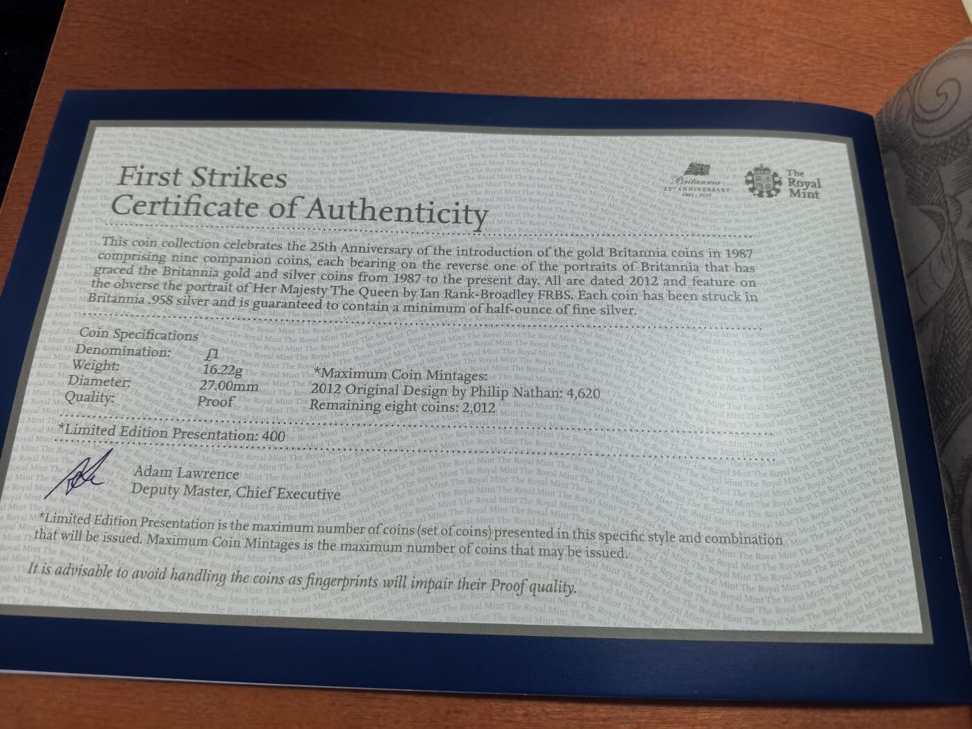 长老汇蛇年精选第一百场拍卖 2012英国纪念不列颠女神金银币发行25周年特别版9枚不列颠女神半盎司1英镑精制银币套装，145.98克958银，盒证全，钢琴烤漆木盒，400套