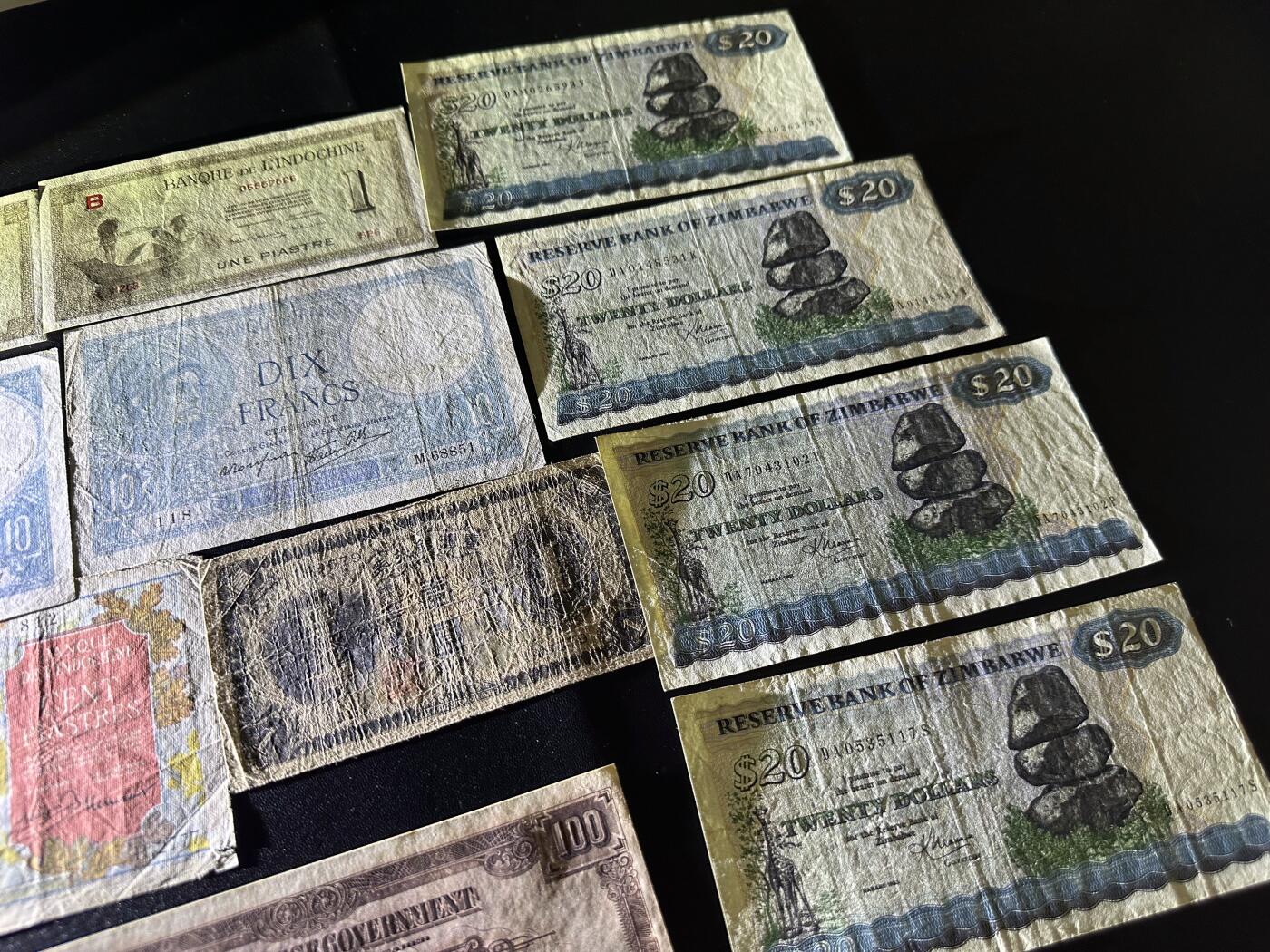 《外钞收藏家》第六百一十期（新年假期场/年后快递恢复正常再发货）（长期征集拍品、欢迎藏友们联系合作） 法属印支、日占时期货币+津巴布韦一起 非全新 品相如图