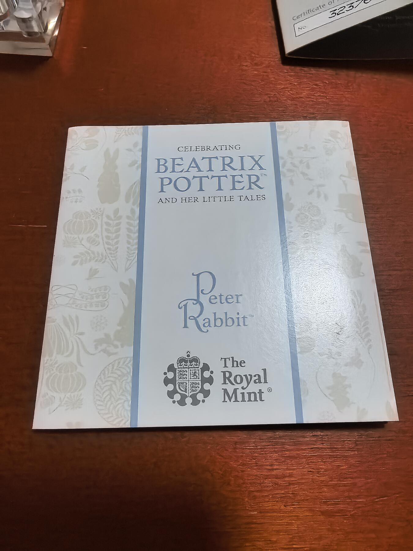 长老汇蛇年精选第一百场拍卖  2018英国彼得兔系列彼得兔50便士精制彩色银币，原盒证