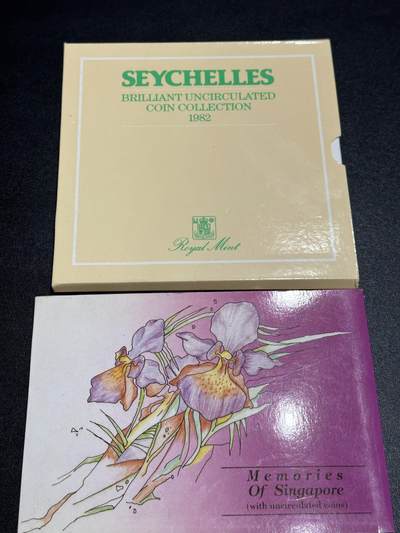 《外钞收藏家》第六百一十期（新年假期场/年后快递恢复正常再发货）（长期征集拍品、欢迎藏友们联系合作） - 塞舌尔套币+新加坡套币 2套一起 精美册子