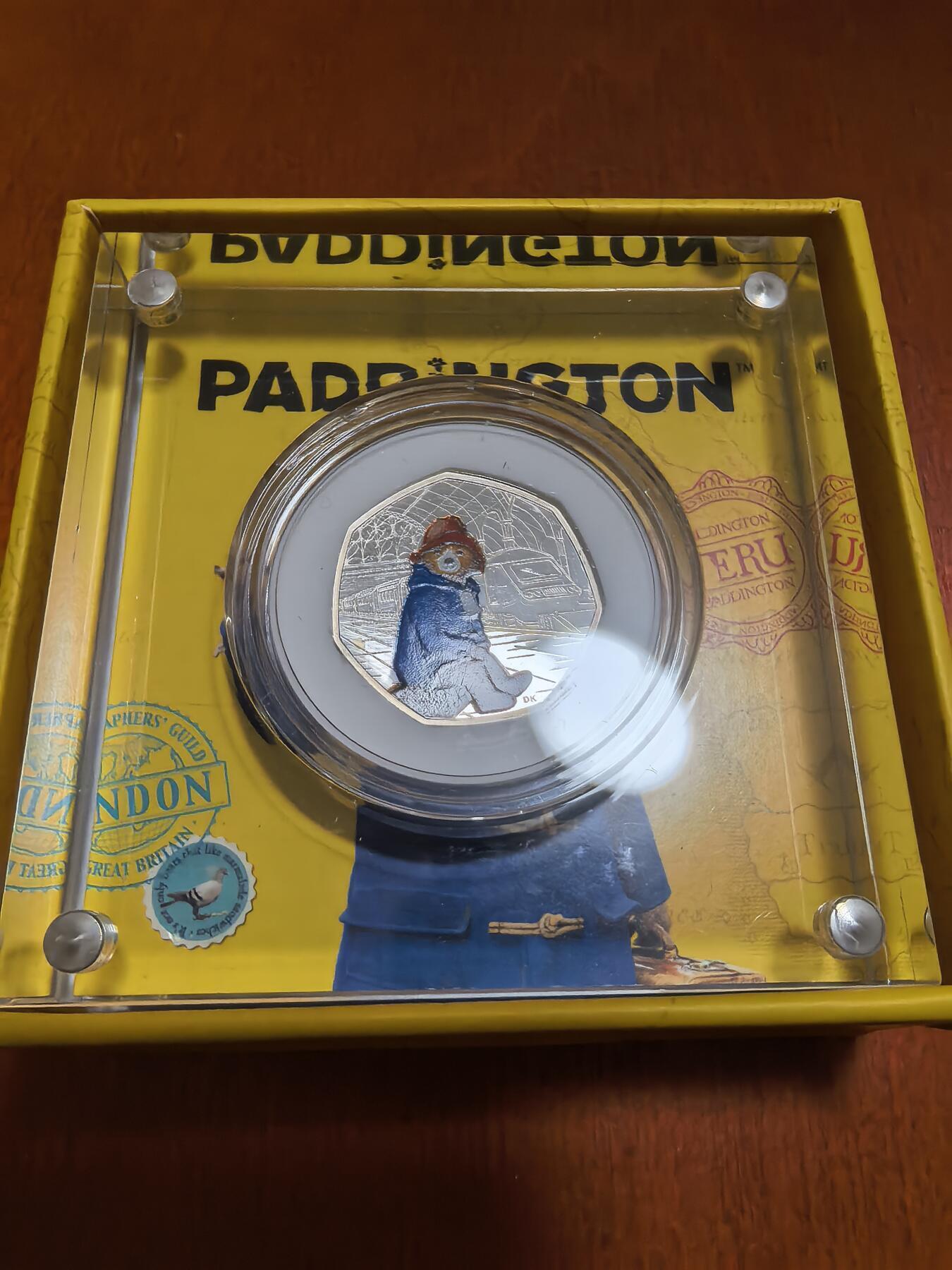 长老汇蛇年精选第一百场拍卖  2018英国帕丁顿熊50便士彩色七边精制银币，925银，6万枚