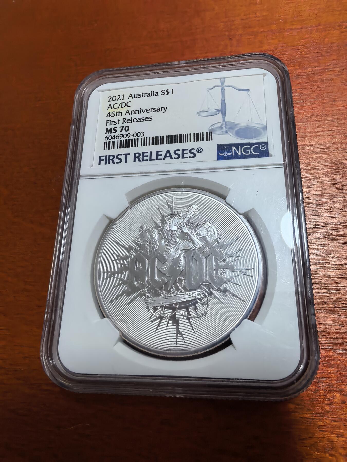 长老汇蛇年精选第一百场拍卖 2021澳大利亚AC/DC乐队45周年1元银币，1盎司999银，3万枚，NGC MS70，首日标