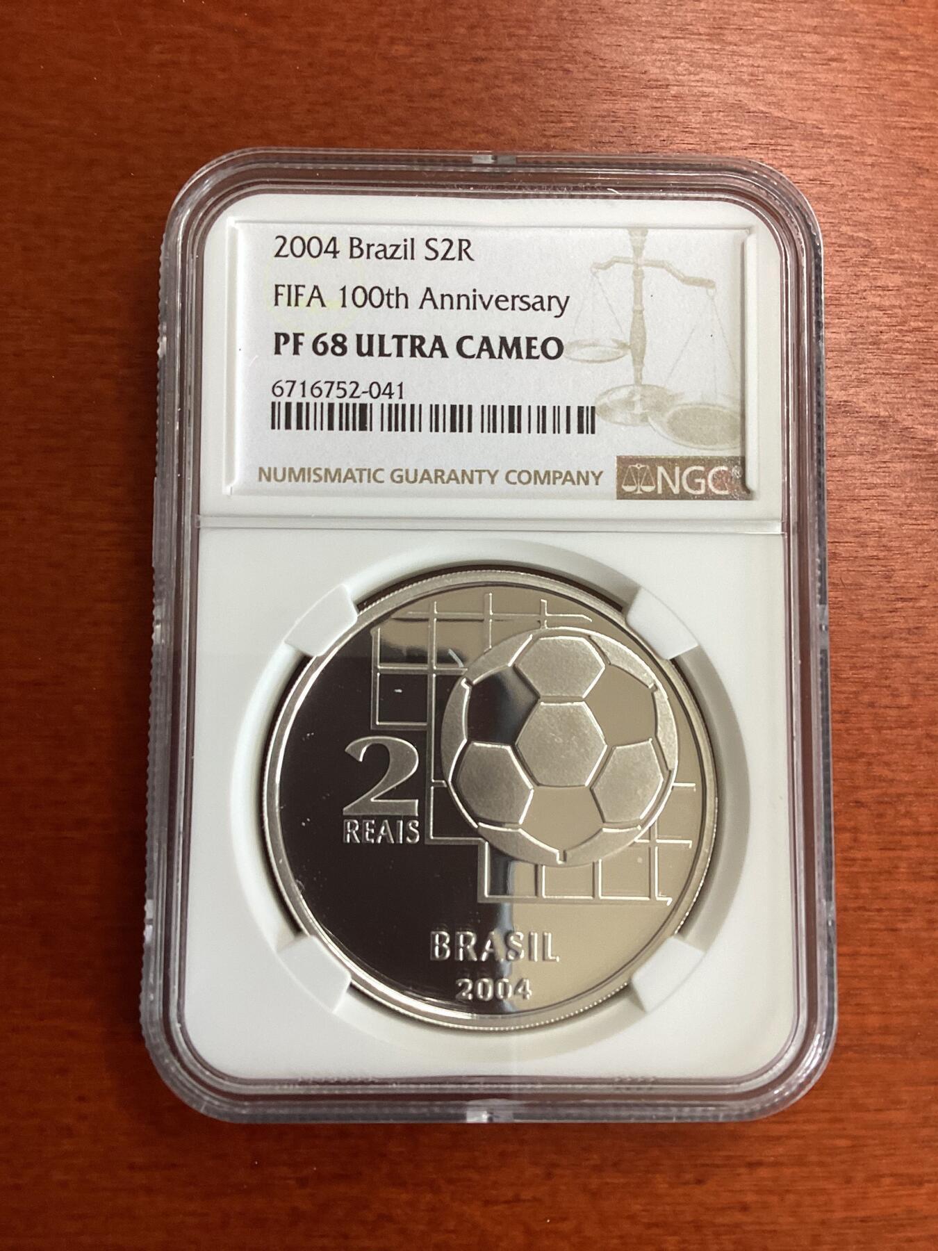 长老汇蛇年精选第一百场拍卖  2004 巴西世界杯百周年2里亚尔精制银币，NGC PF68UC，更高25枚，12166枚，克书价高