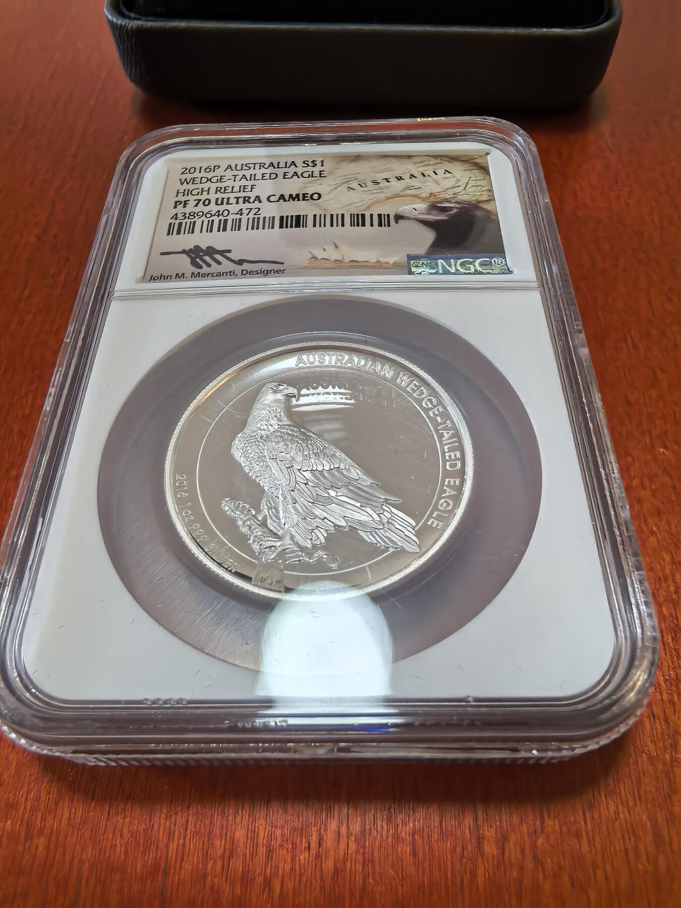 长老汇蛇年精选第一百场拍卖 2016澳大利亚楔尾鹰1元精制高浮雕弧形精制银币，1盎司999银，NGC PF70UC， 雕刻师签名版，高档评级币盒