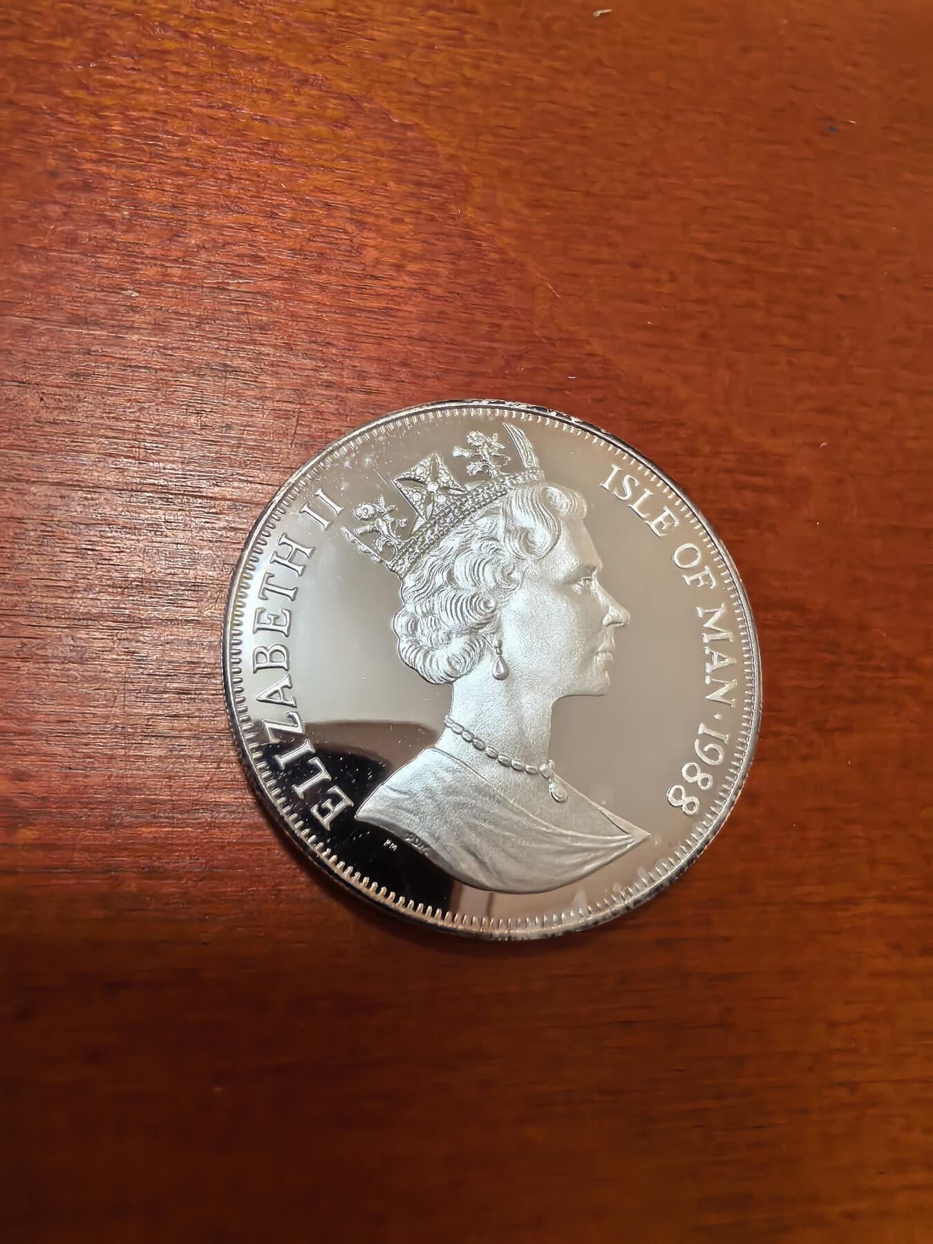 长老汇蛇年精选第一百场拍卖 1988马恩岛世界名猫系列之马恩无尾猫1克朗精制银币，1盎司999银，1.5万枚