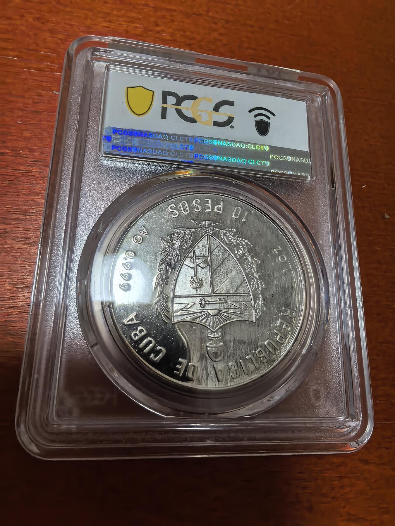 长老汇蛇年精选第一百场拍卖 1990 古巴革命者西莉娅·桑切斯·曼杜利10比索精制银币，PCGS PR67DCAM，唯一冠军，2000枚