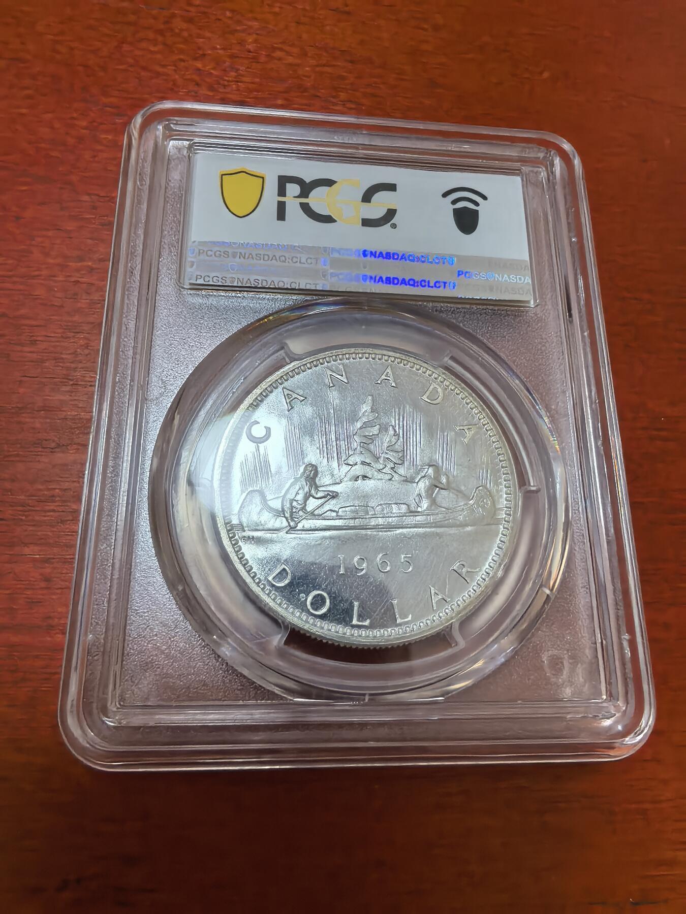 长老汇蛇年精选第一百场拍卖 1965加拿大伊丽莎白二世1加元类精制银币，PCGS PL66CAM，超高分，版别小珠点，尖5，65分克书标价750美金