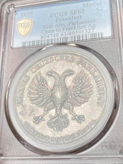 万国钱币拍卖第061期（马年首拍） PCGS SP63 1898年德国法兰克福纪念保罗教堂议会开幕50周年大银章 高浮雕法兰克福双头鹰英姿飒爽 通体原味均匀德式五彩极美 罕见品种收藏级 41mm 33.72g