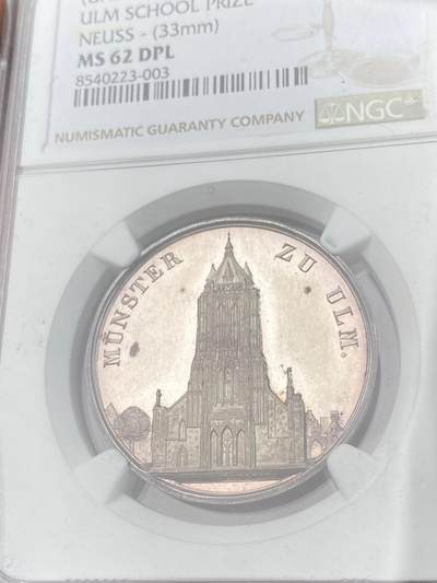 万国钱币拍卖第061期（马年首拍） NGC MS62DPL 1850年左右德国符腾堡-乌尔姆学业优质纪念银章 正面是未完工的乌尔姆大教堂 深度精铸镜面喷砂大教堂极美 浅淡色调的玫瑰红彩极大提升了视觉欣赏效果 顶级收藏品质