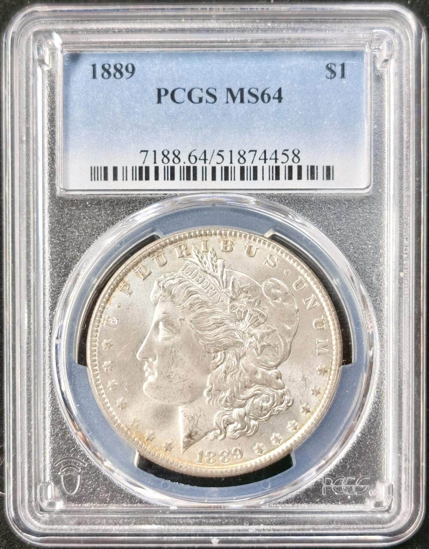 “福币呈祥”新年甄品场（直播拍卖）甄臻铺-世界币章拍卖（第50期），送拍享返佣金等优惠多多 PCGS-MS64 美国 1889年 摩根 银币 正面环彩带银霜 背面金彩带火烧云彩