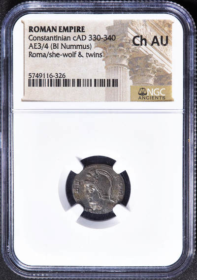 【俄甄集藏】马年新春第一拍 2026年(048)02-25星期三 晚 19:30 全场包邮 - 古罗马帝国公元332-333年君士坦丁大帝罗马建城纪念母狼育婴铜币，NGC Ch AU，罗马造币场第4造币作坊打制，正面罗马女神戴盔披氅面左胸像。币文为“罗马城”，背面母狼哺婴源自罗马建城传说，母狼正哺育罗慕路斯和雷穆斯兄弟。母狼上有两颗芒星，君士坦丁一世虽然建成了新罗马城（君士坦丁堡），但对原罗马城仍怀有眷恋之情，直径：16mm