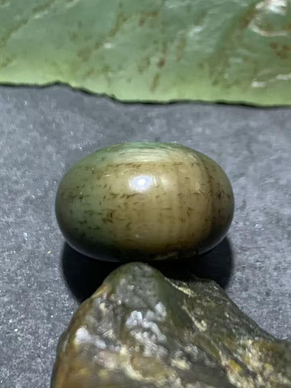 缠丝玛瑙算盘珠1颗，