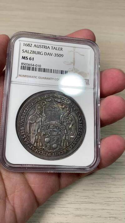 万国钱币拍卖第061期（马年首拍） NGC MS61 1682年神圣罗马帝国萨尔茨堡主教区建立1100周年马克西米安·甘道夫大泰勒 早期大规格神罗教区泰勒 好品难得一见 原味欧陆五彩环绕极美 顶级收藏品质