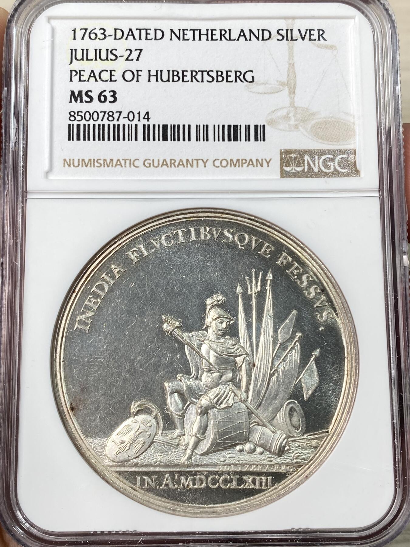 万国钱币拍卖第061期（马年首拍） NGC MS63 1763年尼德兰联省共和国巴黎合约纪念银章 44M 正面战神MARS收起利剑坐在战利品上 背面荷兰女神指向荷兰战舰标注坚定者和自由者 巴黎和约是1763年英、法、西班牙等国为结束七年战争而签订的和平条约 标志着欧洲列强在北美、印度等地殖民争霸的阶段性终结 顶级精铸镜面高浮雕喷砂收藏级品质 麦稀奇首拍超罕见品种