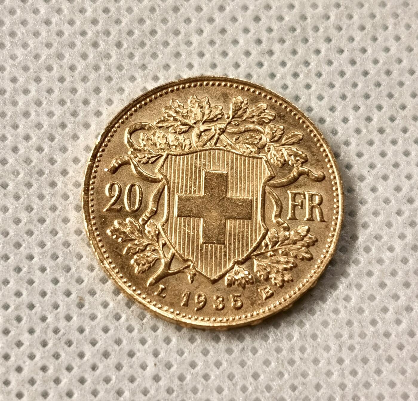 “福币呈祥”新年甄品场（直播拍卖）甄臻铺-世界币章拍卖（第50期），送拍享返佣金等优惠多多 瑞士 1935年 20法郎 雪山女神 金币 6.45g 900金