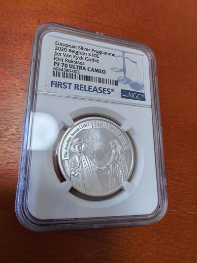 长老汇蛇年精选第一百场拍卖 - 2020 欧洲之星比利时扬·凡·艾克的名画《阿诺菲尼夫妇》10欧元精制银币，NGC PF70UC，3枚并列冠军之一，首期标，该币还原原画，把镜子中的映像都刻出来了，发行5000枚